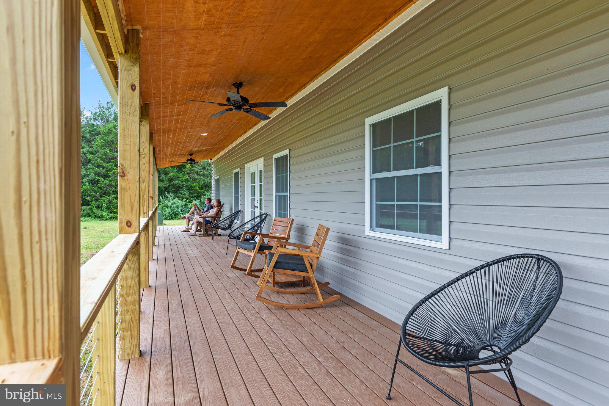 1195 Mountain View Drive Rileyville, VA 22650 - Photo 28 of 35 a view of a house with lounge chair and wooden floor