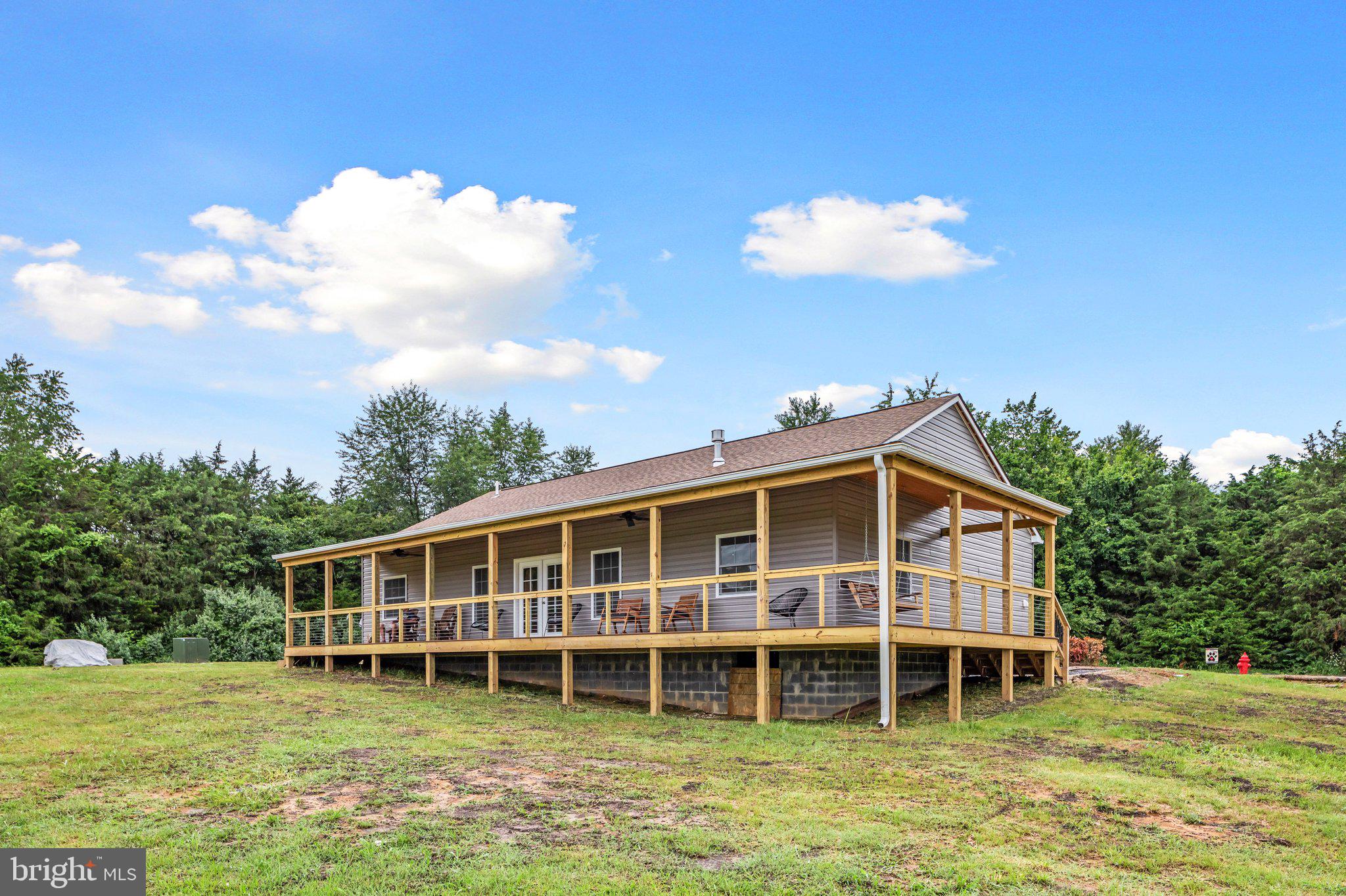 1195 Mountain View Drive Rileyville, VA 22650 - Photo 30 of 35 a view of a house with a backyard