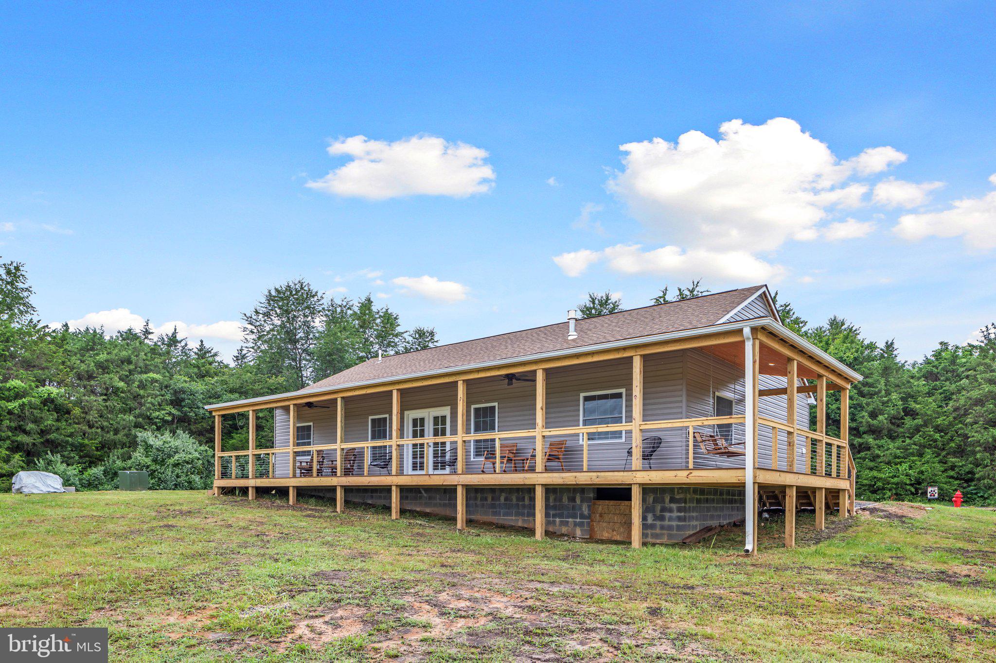 1195 Mountain View Drive Rileyville, VA 22650 - Photo 31 of 35 a view of a house with a yard