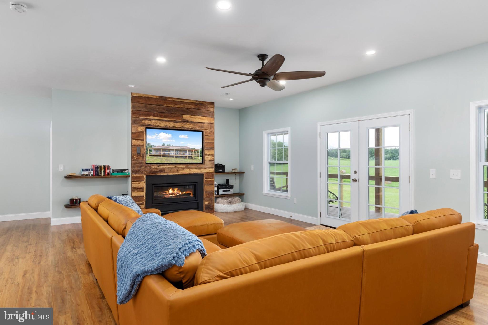 1195 Mountain View Drive Rileyville, VA 22650 - Photo 35 of 35 a living room with furniture and a flat screen tv