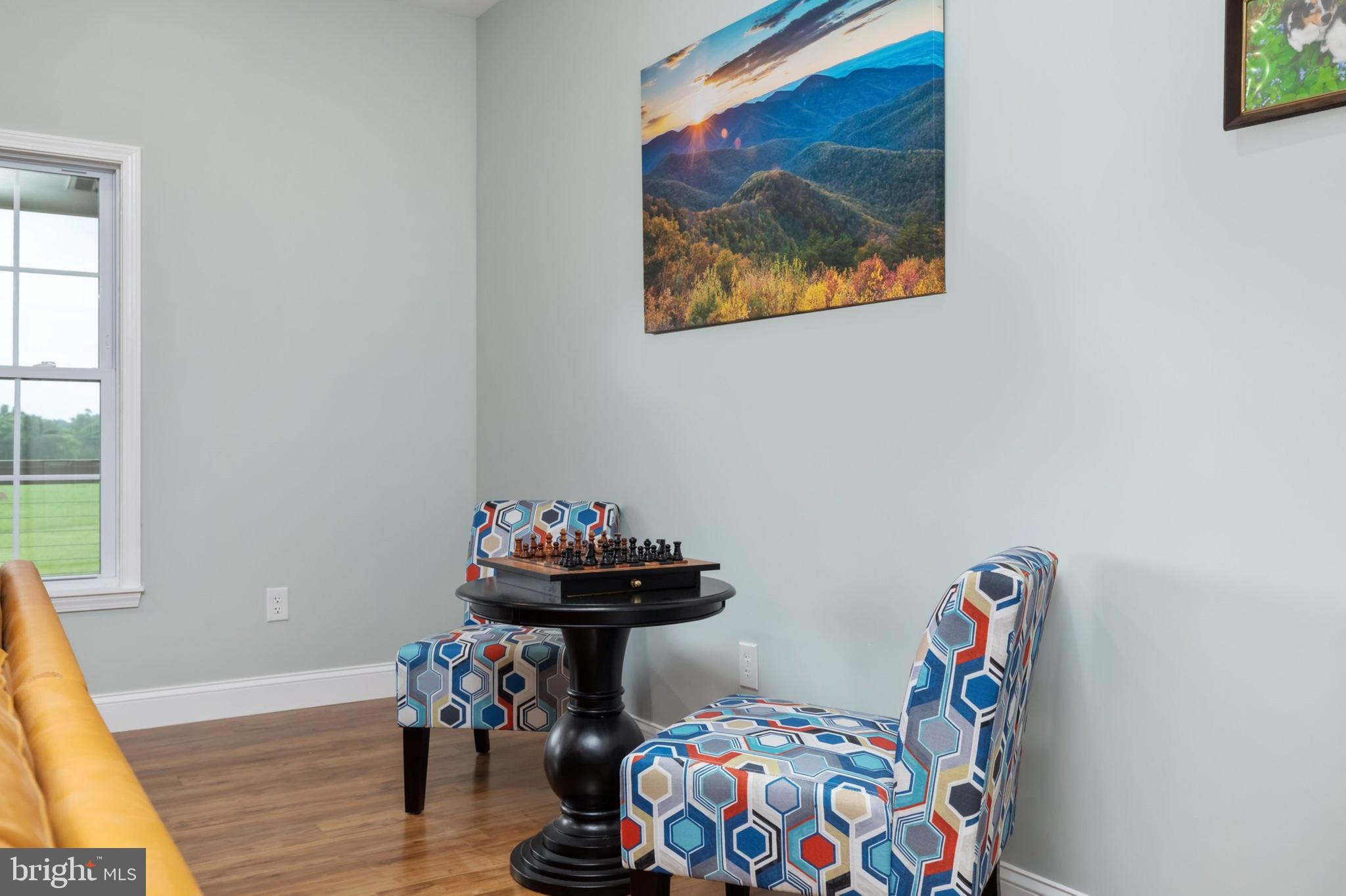 1195 Mountain View Drive Rileyville, VA 22650 - Photo 4 of 35 a bedroom with a bed and a window