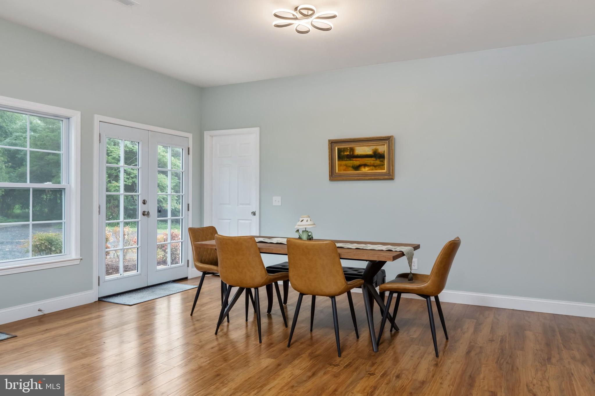 1195 Mountain View Drive Rileyville, VA 22650 - Photo 9 of 35 a view of a dining room with furniture and wooden floor