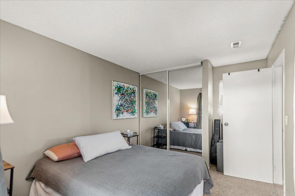 3047 Highlands Boulevard Spring Valley, CA 91977 - Photo 29 of 39 a bedroom with a bed and furniture