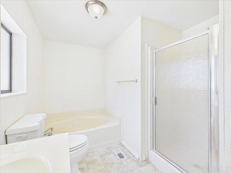 37589 Montezuma Valley Road Ranchita, CA 92066 - Photo 29 of 43 a bathroom with a bathtub and a shower