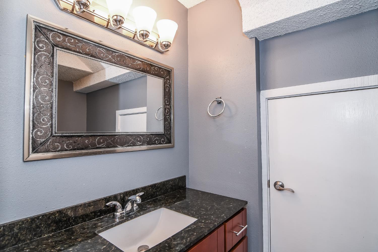 1139 Rivara Circle Sacramento, CA 95864 - Photo 26 of 72 a bathroom with a sink and a mirror