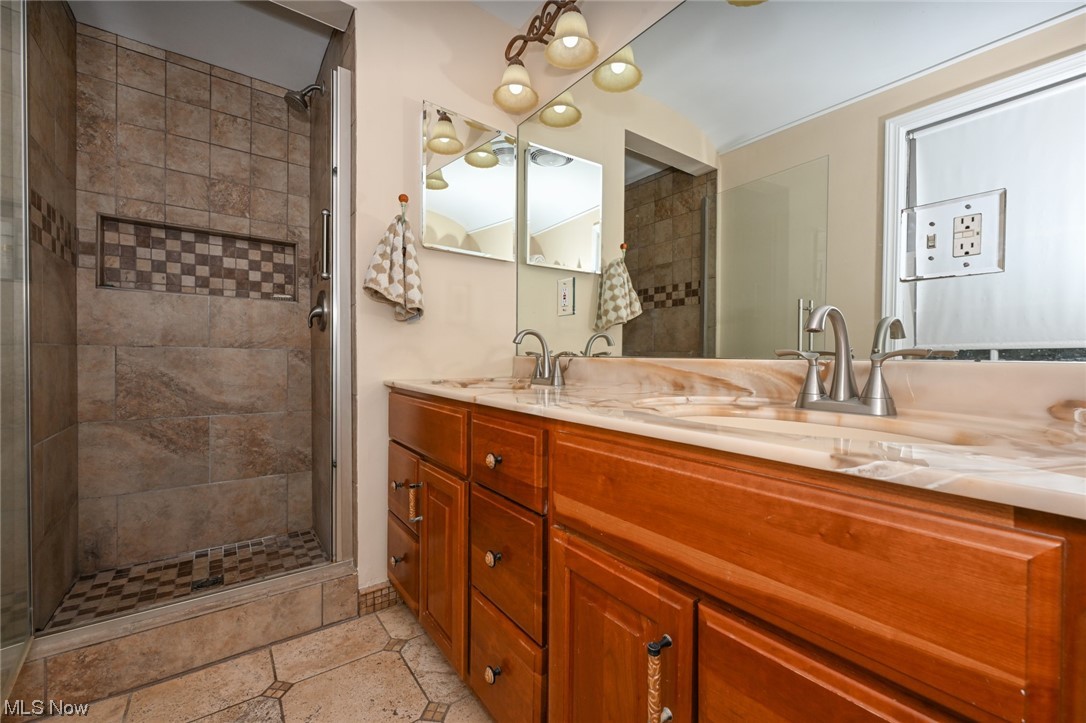 300 Simon Road Hudson, OH 44236 - Photo 19 of 35 Owner's Bath Features Dual Sinks and Walk-In Shower