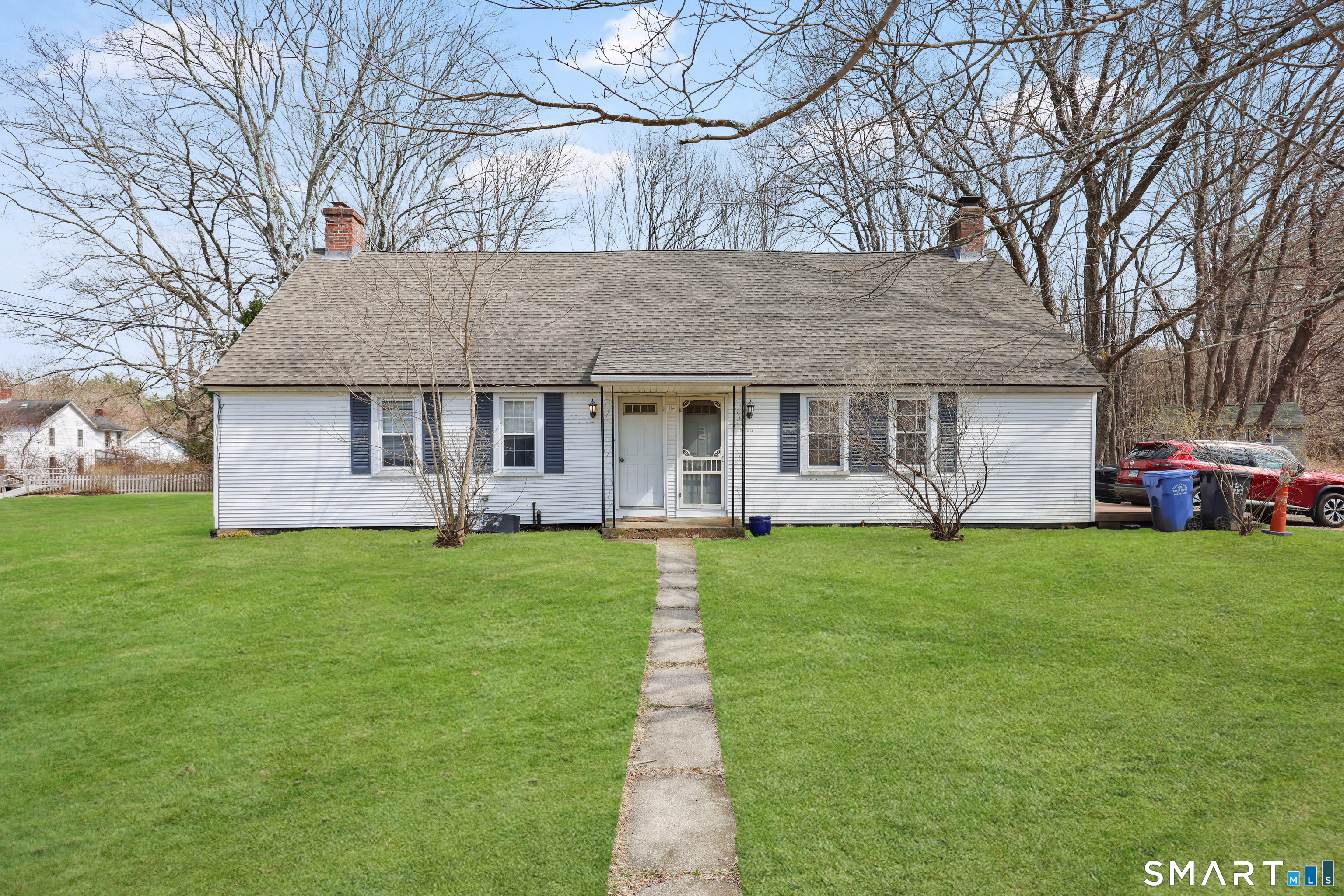 111 Depot Road Mansfield, CT 06268 - Photo 3 of 7 a front view of a house with a garden and porch