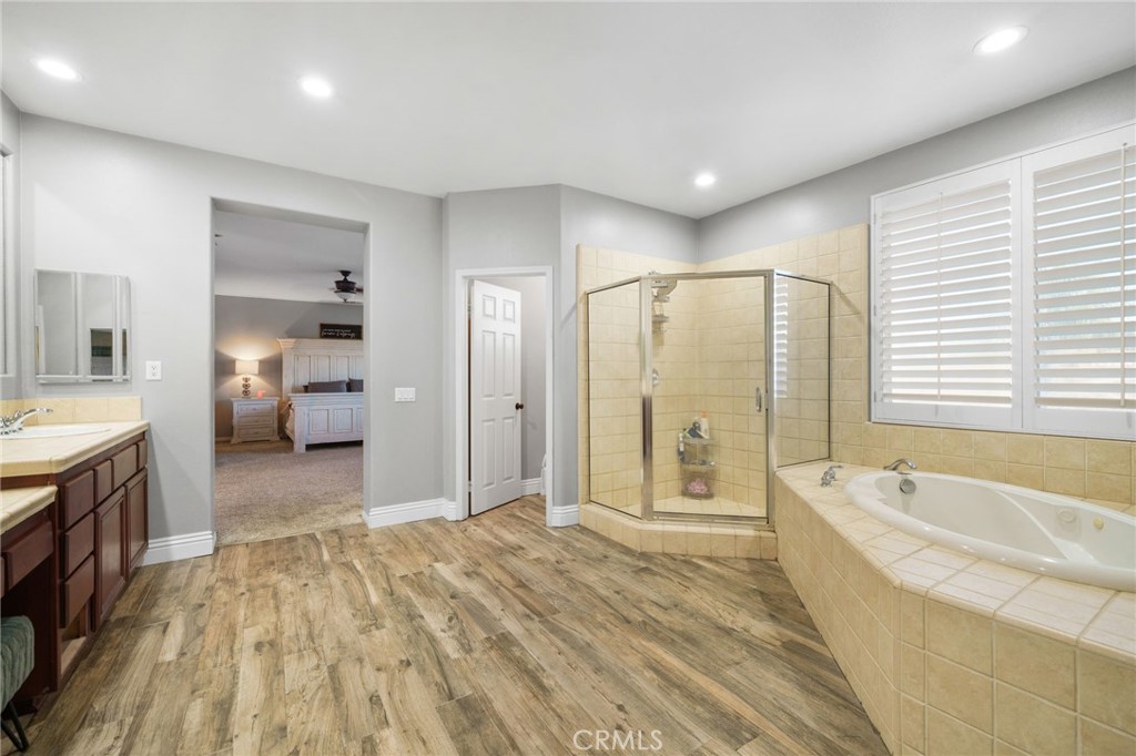 18604 Sunset Knoll Drive Riverside, CA 92504 - Photo 31 of 66 Walk-in Shower and soaking tub.
