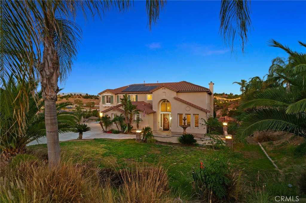 18604 Sunset Knoll Drive Riverside, CA 92504 - Photo 42 of 66 a view of a garden with a house