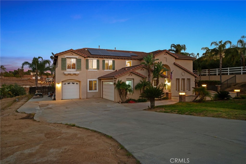 18604 Sunset Knoll Drive Riverside, CA 92504 - Photo 43 of 66 a front view of a house with a yard