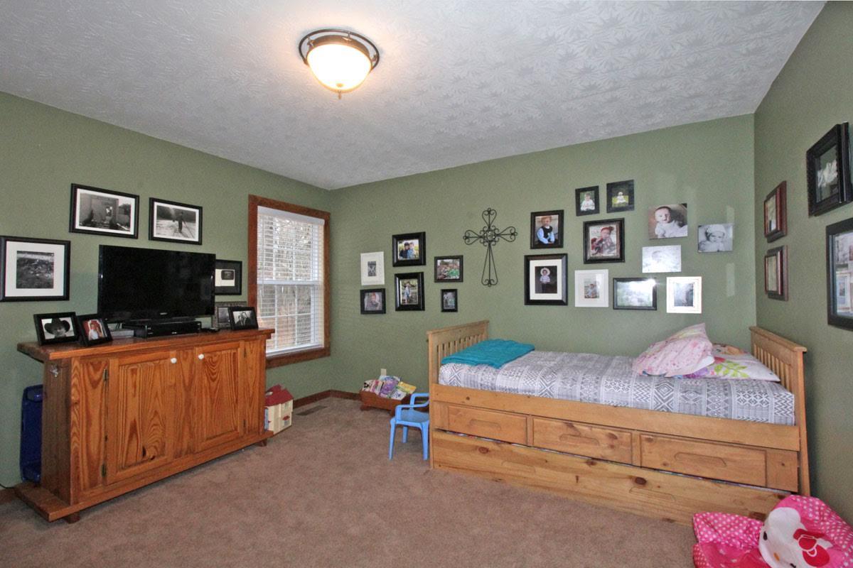 4780 Benson Road Springfield, TN 37172 - Photo 8 of 25 Bedroom 2 will comfortably allow for a Queen bed ro fit between the two windows.