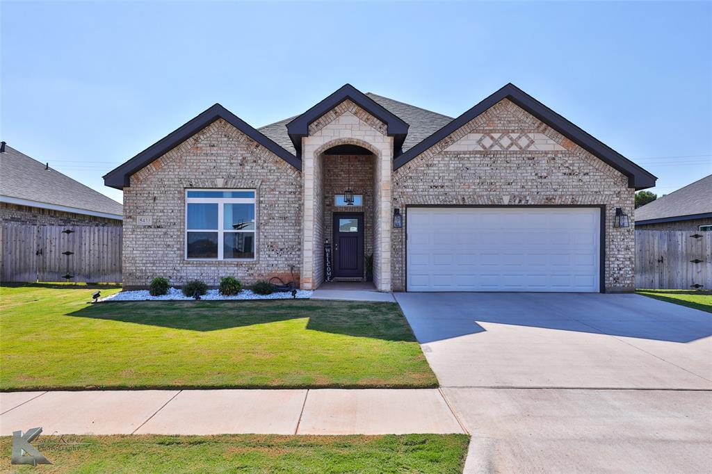 5433 Fallbrook Drive Abilene, TX 79606 - Photo 1 of 1 a front view of a house with a yard and garage