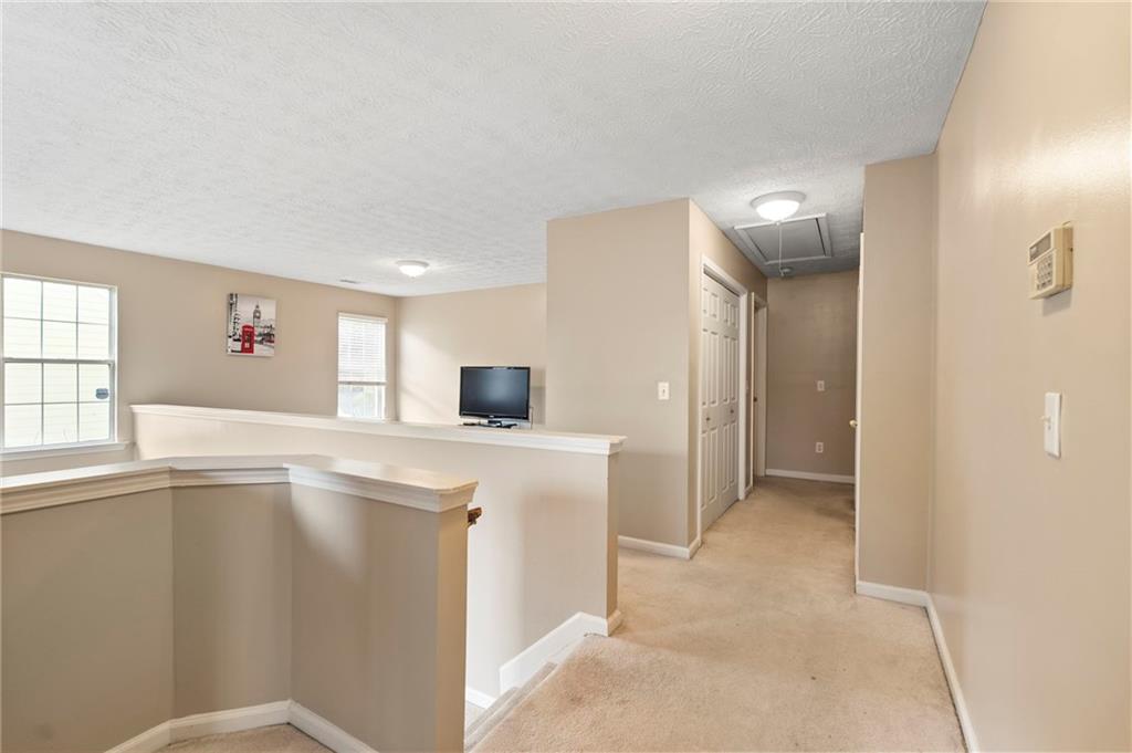 905 Ahearn Court Suwanee, GA 30024 - Photo 14 of 26 a view of an empty room and window