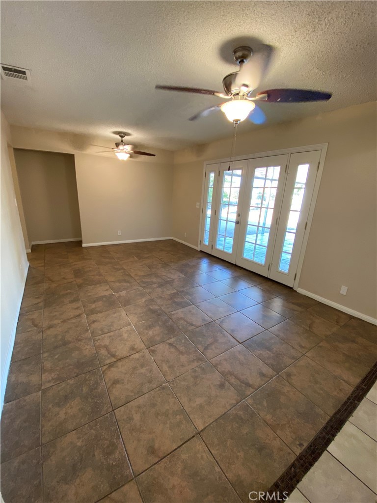 18746 Rock Springs Road Hesperia, CA 92345 - Photo 10 of 21 a view of an empty room and window