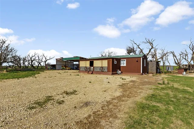 a front view of a house having yard
