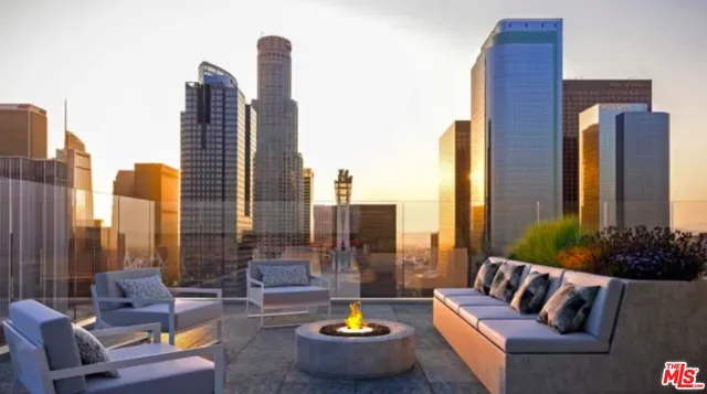 a outdoor living space with furniture and a potted plant