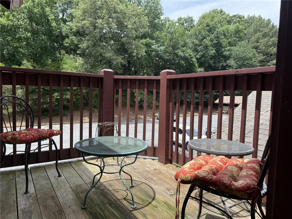 105 Hawkstone Way Alpharetta, GA 30022 - Photo 21 of 23 a view of a chairs and table in the balcony