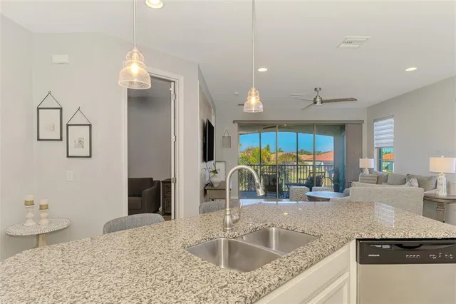 a bedroom with a bed dresser and a window