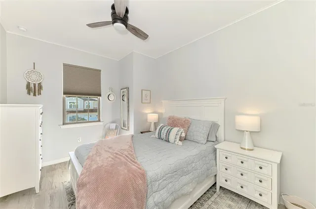 an aerial view of a house with garden space and street view