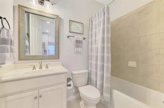 an aerial view of a house with a ocean view