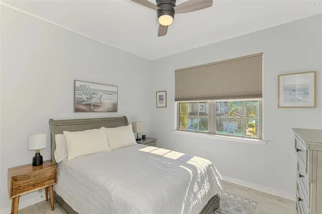 a living room with furniture a rug and a chandelier