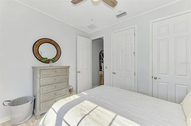 a living room with pool table flat screen tv and window