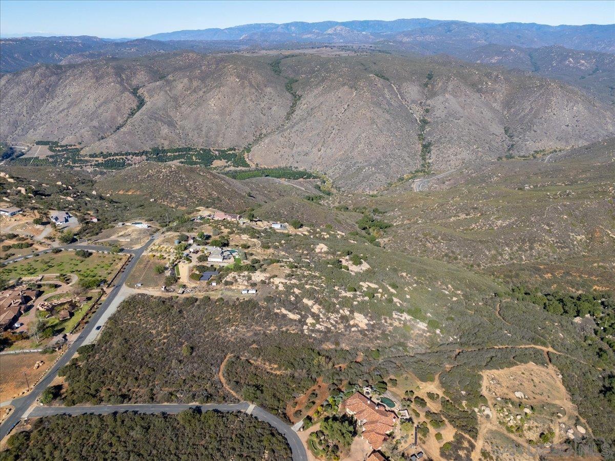 0 Downs Way, Unit A70 Ramona, CA 92065 - Photo 5 of 11 a view of a dry yard with trees
