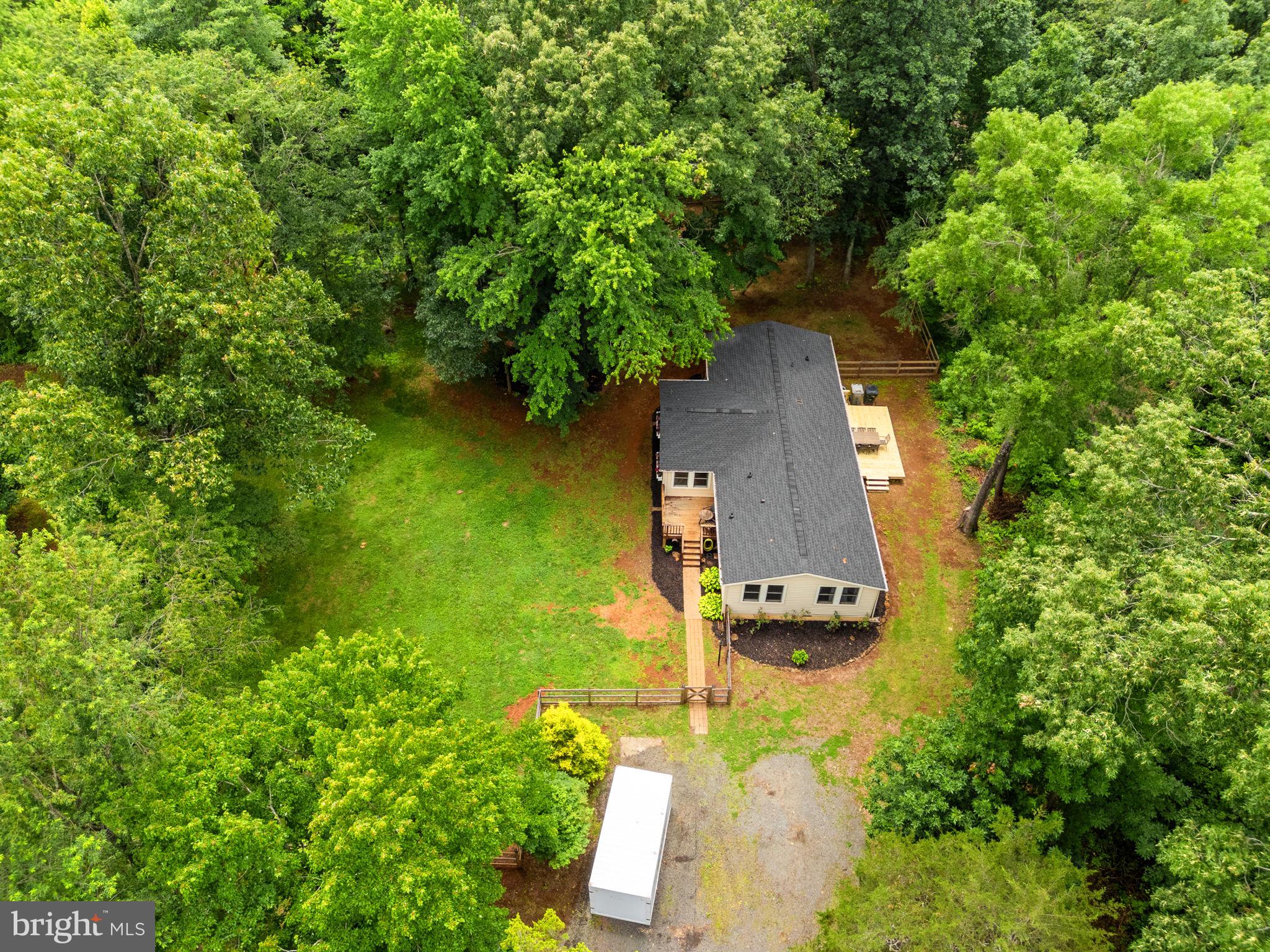 9448 Green Road Midland, VA 22728 - Photo 90 of 91 an aerial view of a house with a yard basket ball court and outdoor seating