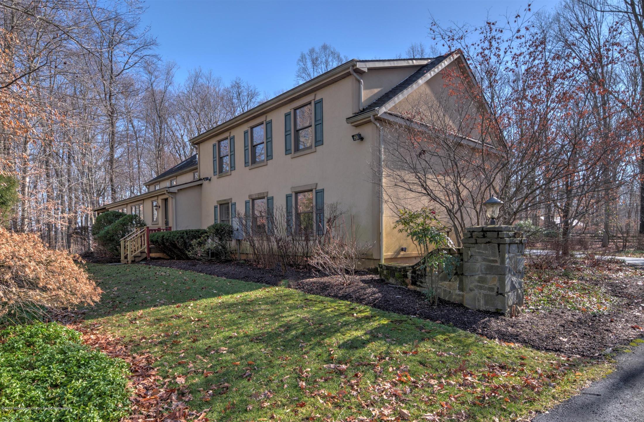 886 Province Line Road Allentown, NJ 08501 - Photo 1 of 56 a front view of a house with a yard and pathway