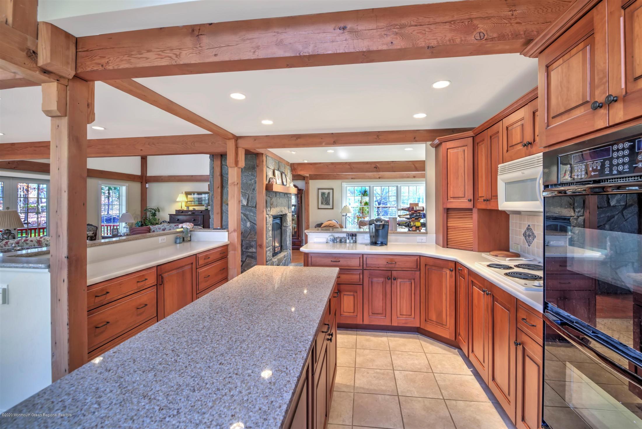 886 Province Line Road Allentown, NJ 08501 - Photo 20 of 56 a large kitchen with stainless steel appliances granite countertop a large counter top a stove and a refrigerator