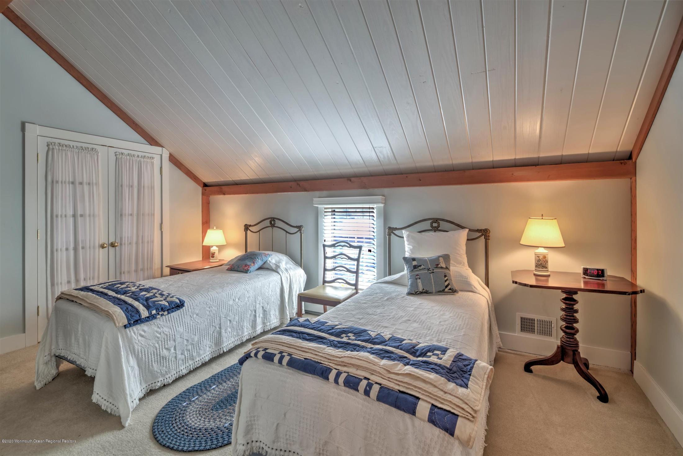 886 Province Line Road Allentown, NJ 08501 - Photo 29 of 56 a bedroom with double bed and a window