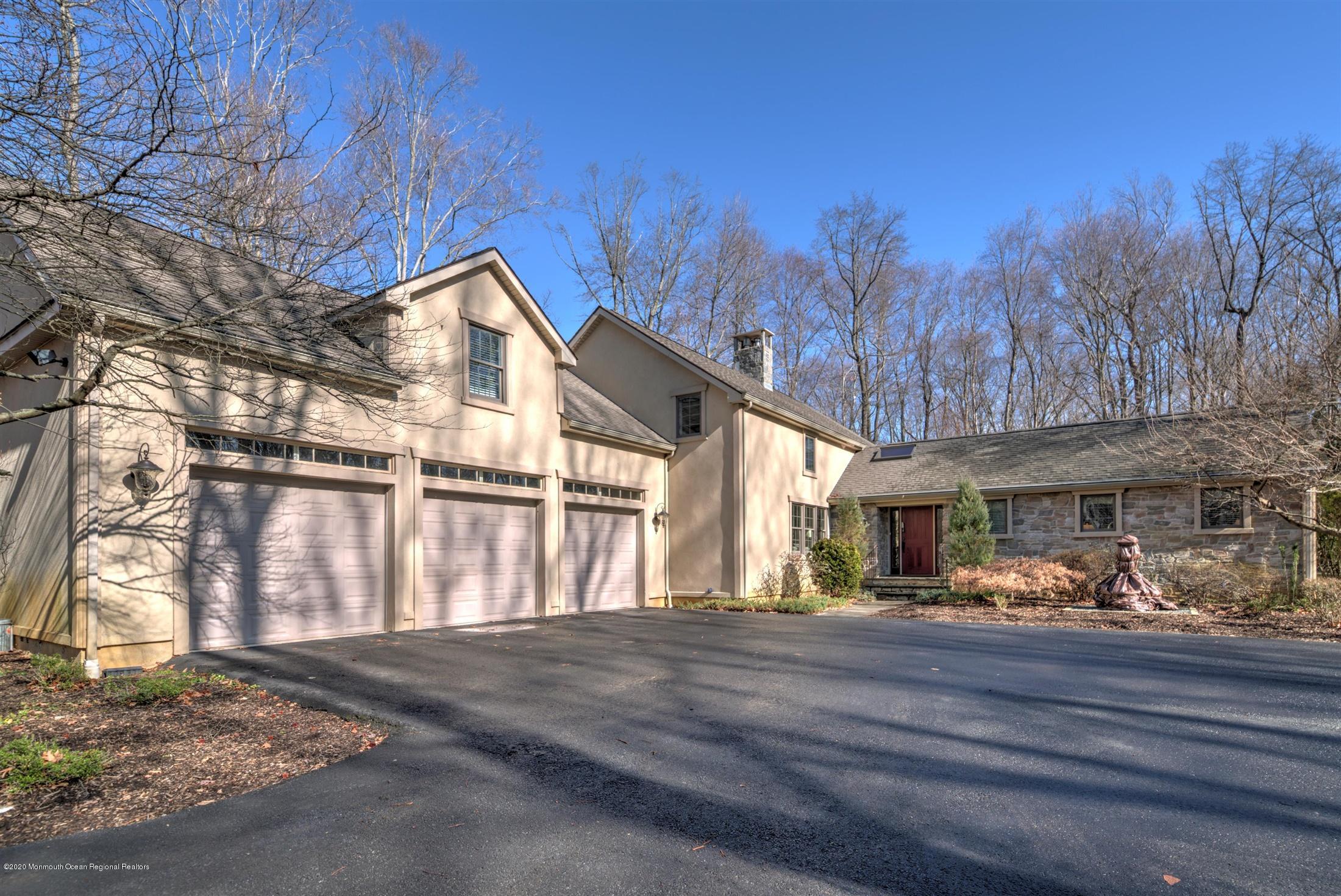 886 Province Line Road Allentown, NJ 08501 - Photo 41 of 56 a front view of a house with street