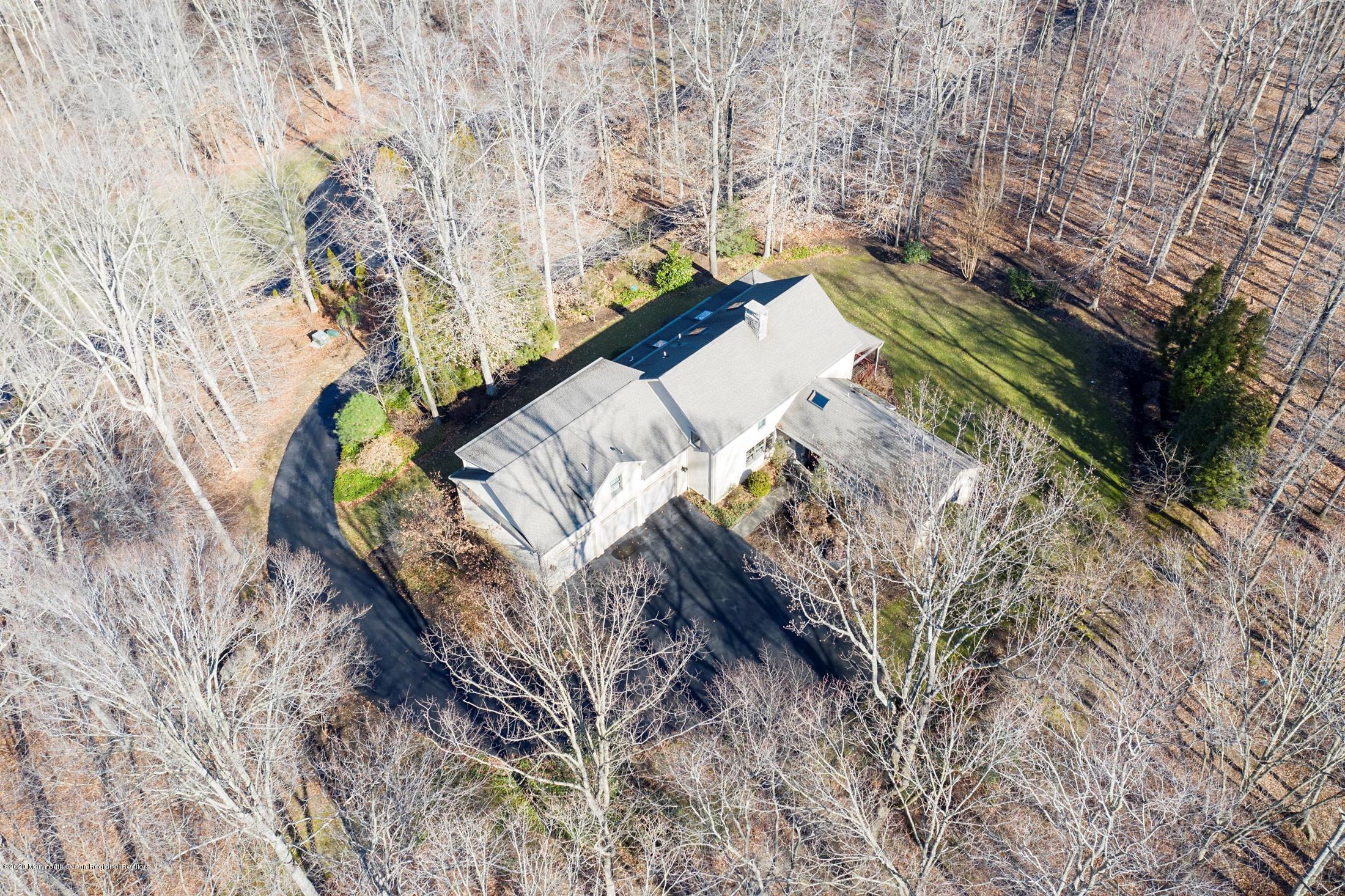 886 Province Line Road Allentown, NJ 08501 - Photo 45 of 56 a view of a yard with wooden fence