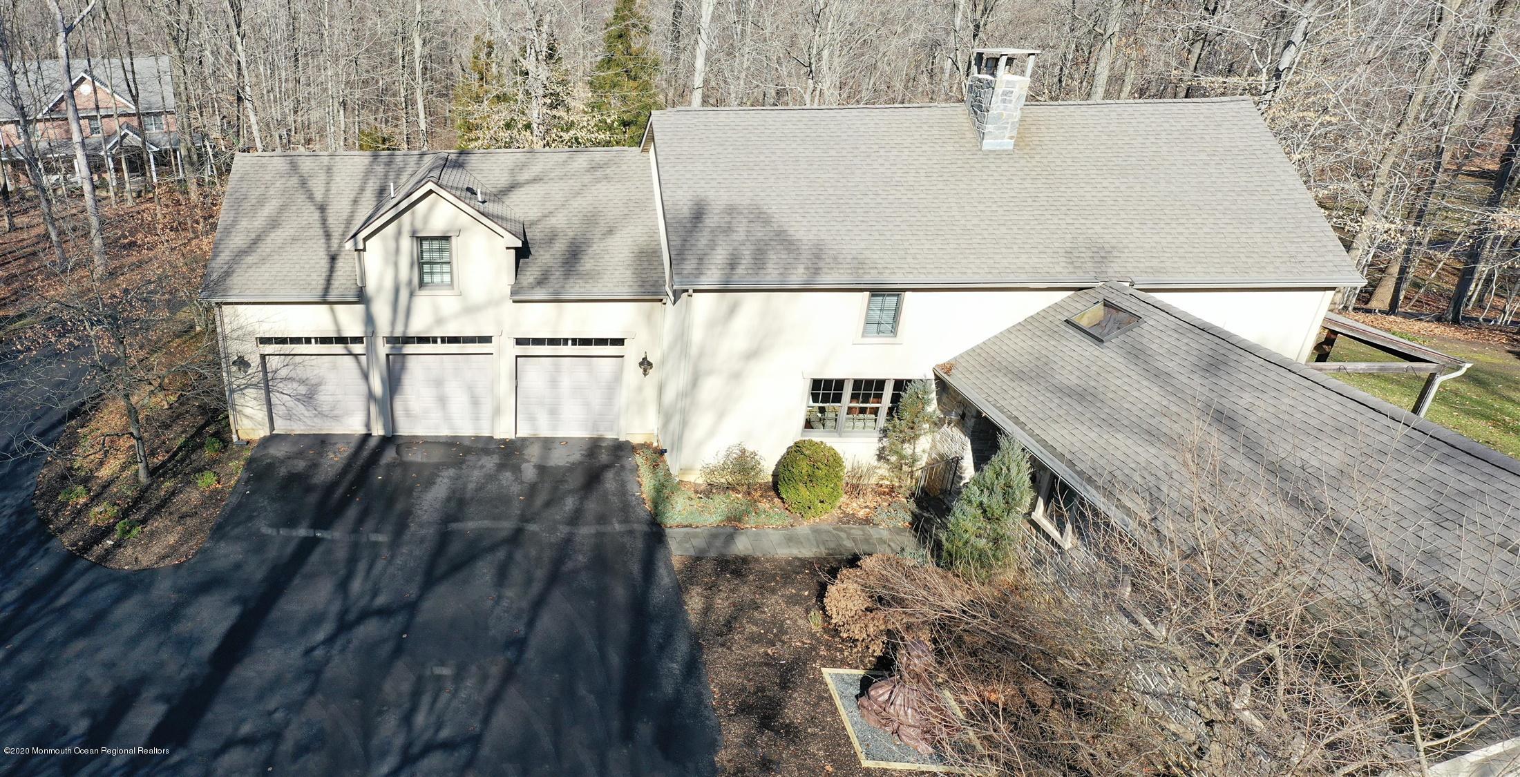 886 Province Line Road Allentown, NJ 08501 - Photo 51 of 56 a view of a balcony with chair and wooden floor