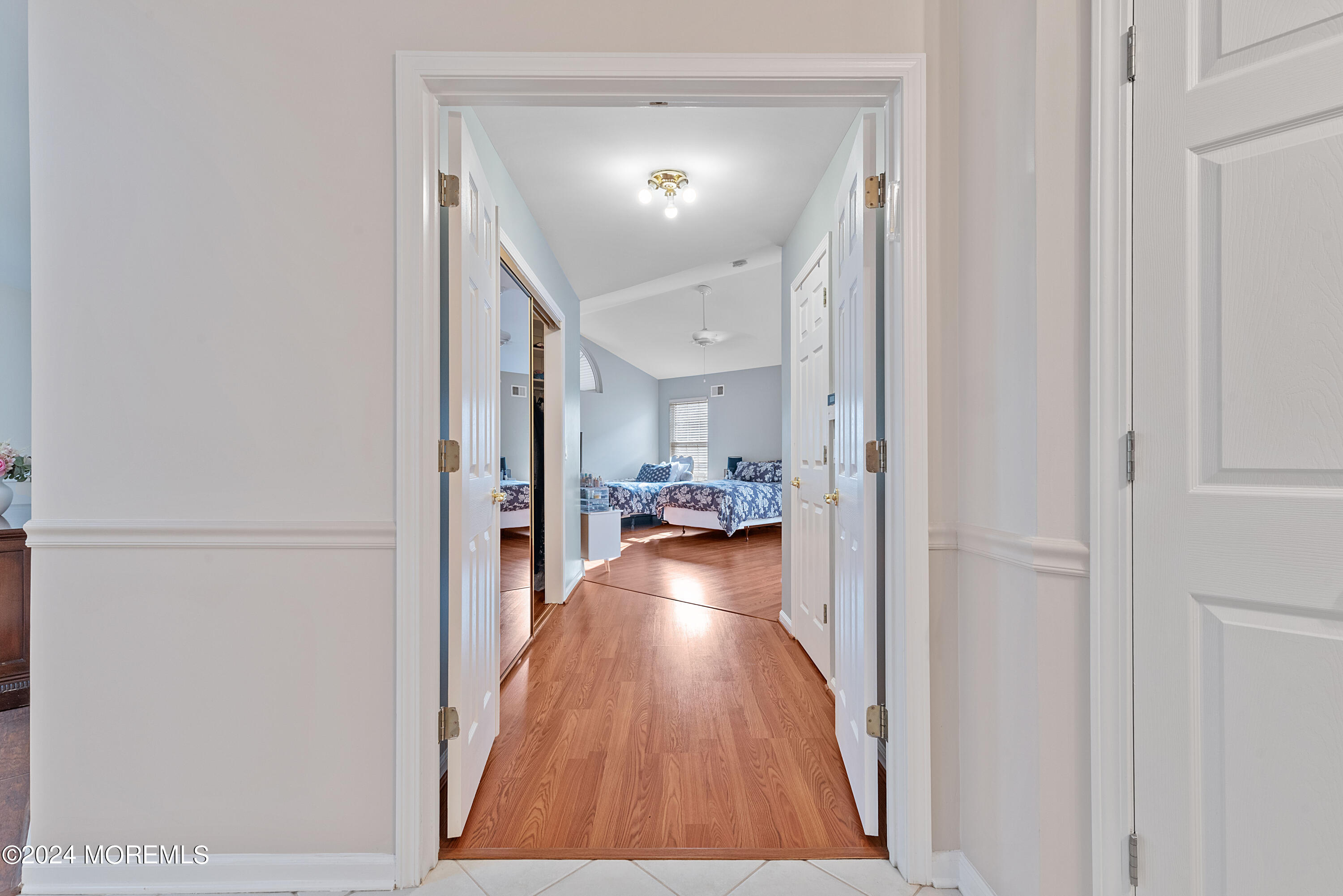 54 Foxwood Road Lakewood, NJ 08701 - Photo 15 of 45 a view of a hallway view of the house and wooden floor