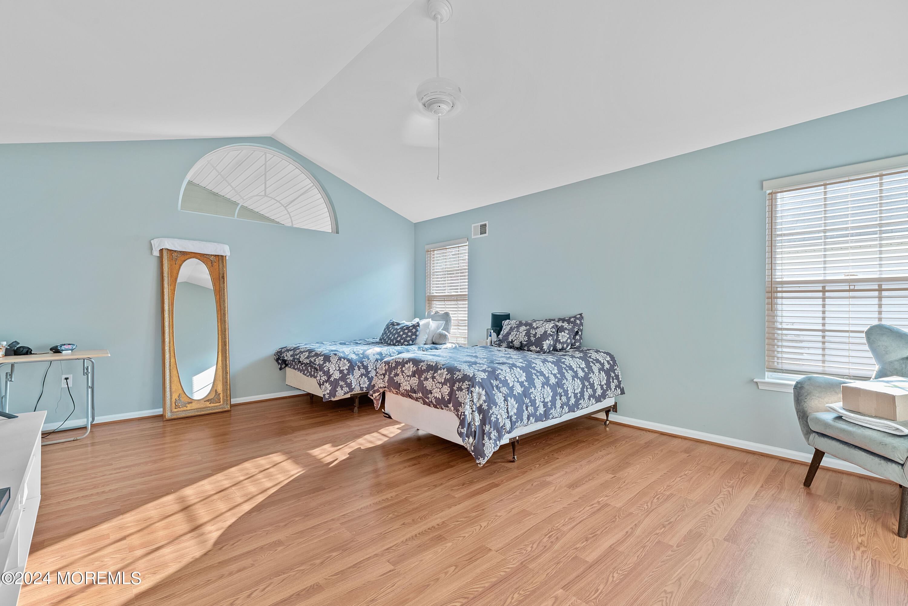 54 Foxwood Road Lakewood, NJ 08701 - Photo 16 of 45 a bedroom with a bed and wooden floor