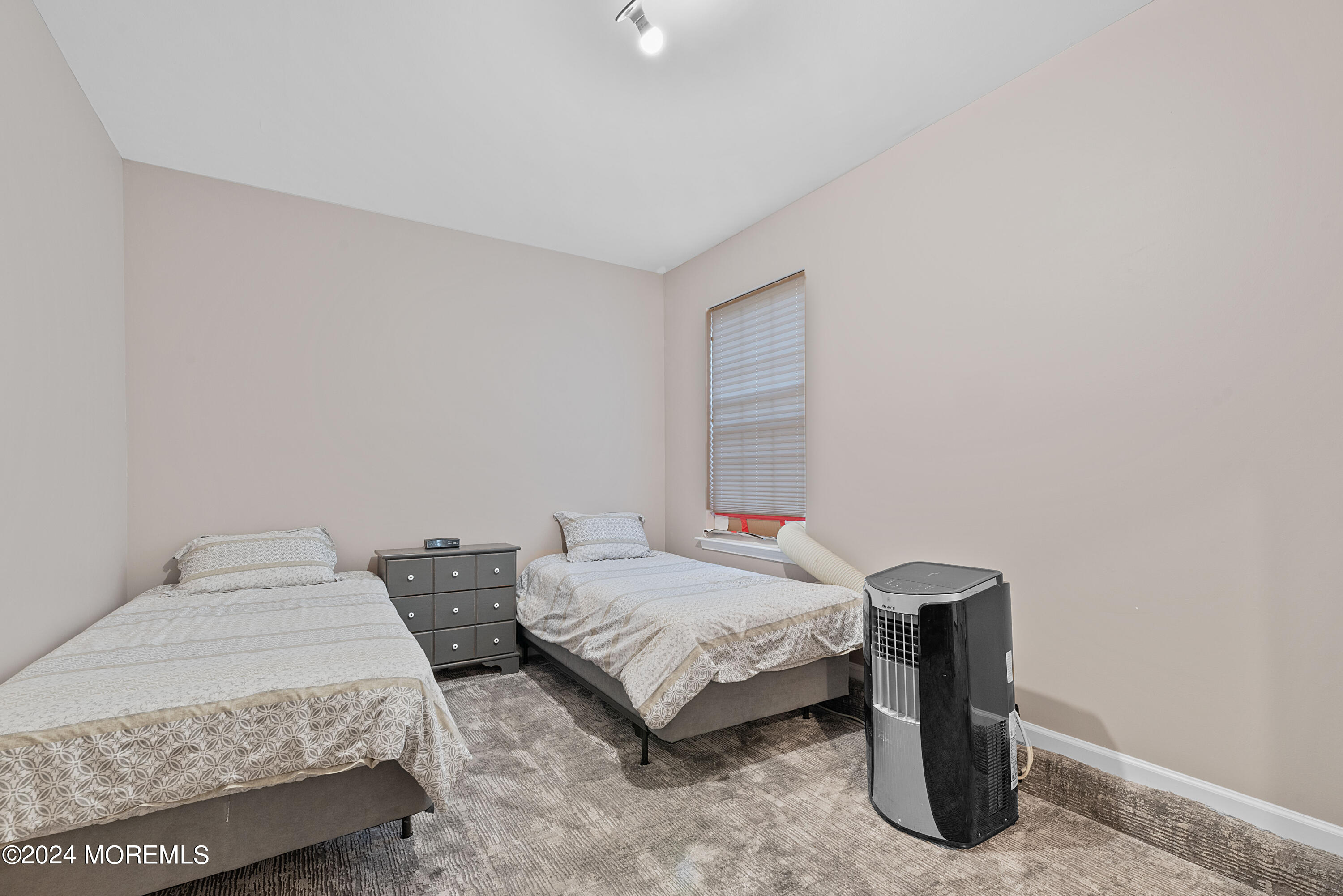 54 Foxwood Road Lakewood, NJ 08701 - Photo 27 of 45 a bedroom with a bed and a window