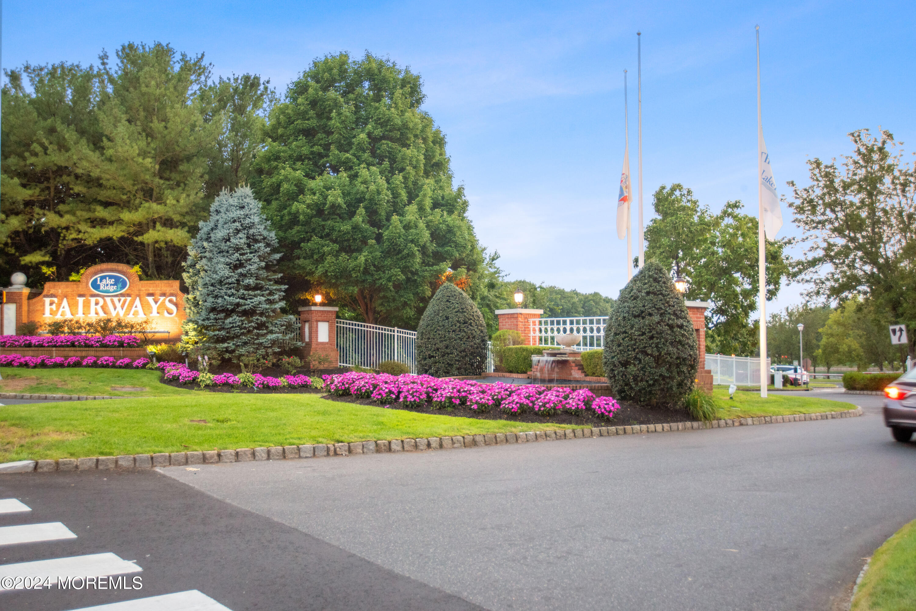 54 Foxwood Road Lakewood, NJ 08701 - Photo 44 of 45 a street sign on the side of the road