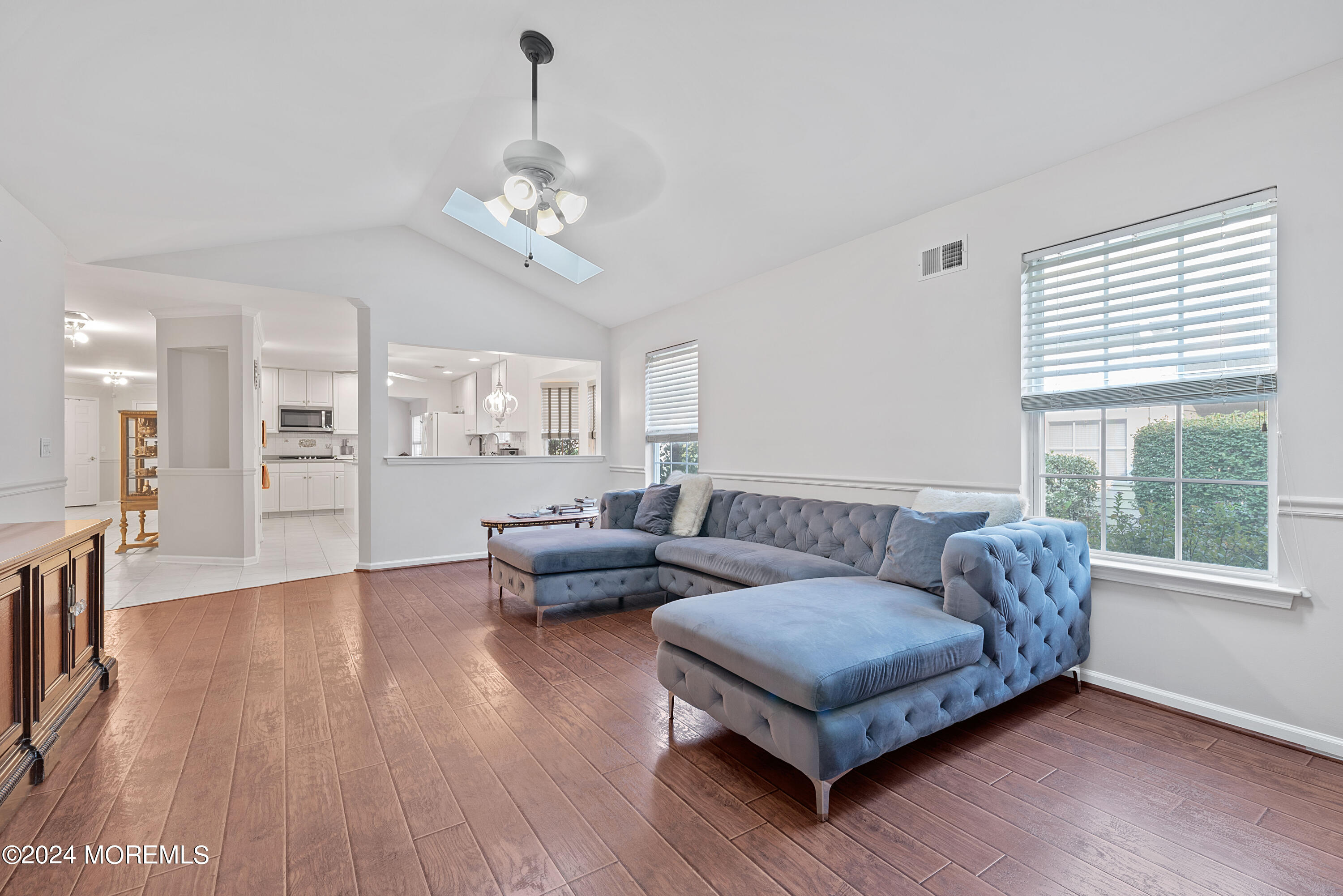 54 Foxwood Road Lakewood, NJ 08701 - Photo 8 of 45 a living room with furniture and wooden floor
