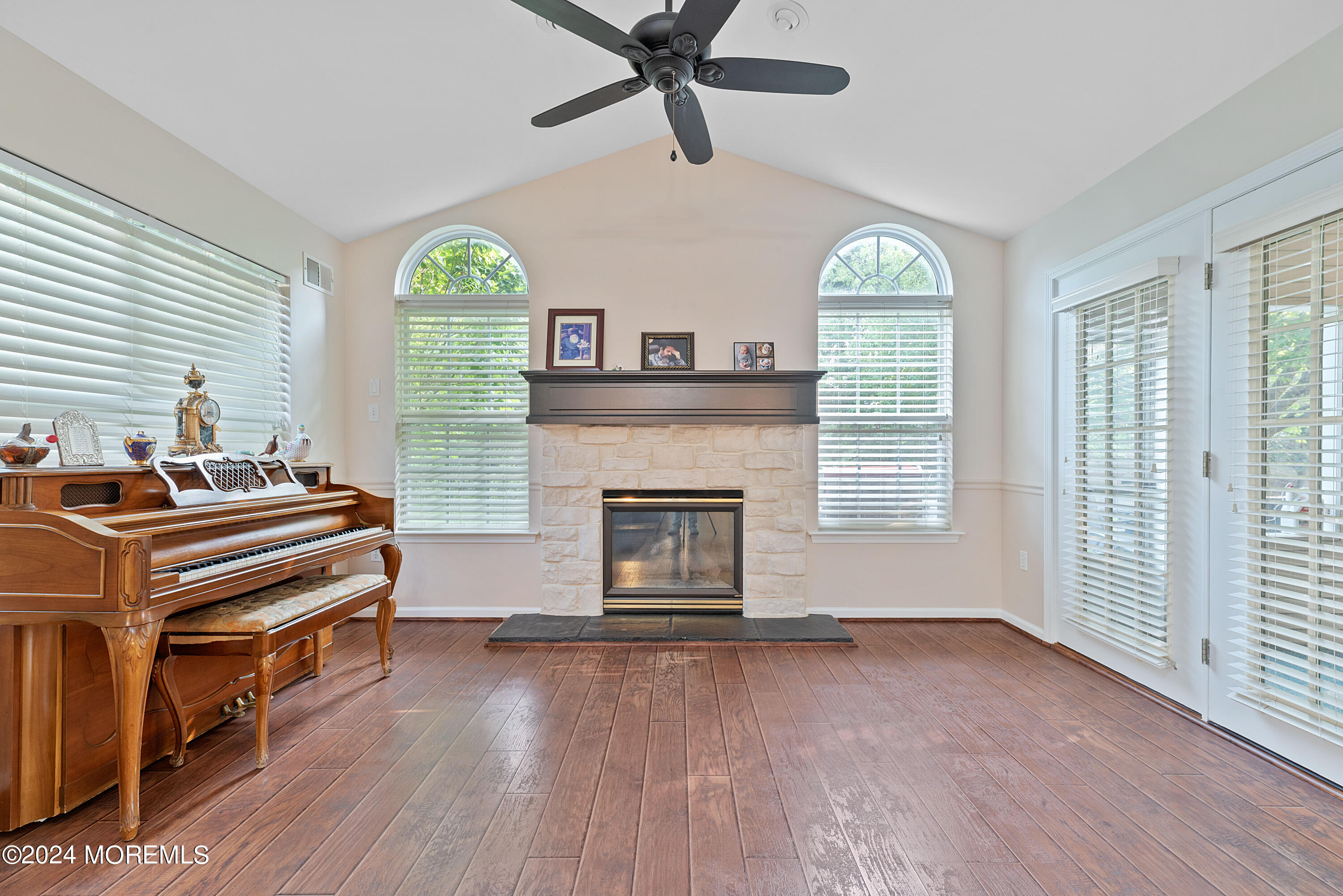 54 Foxwood Road Lakewood, NJ 08701 - Photo 10 of 45 a living room with furniture and a fireplace
