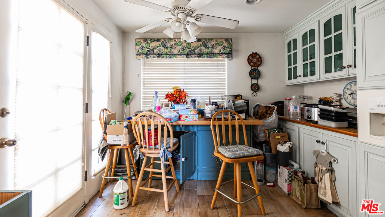 25843 Browning Place Stevenson Ranch, CA 91381 - Photo 17 of 37 a view of a dining room with furniture and wooden floor