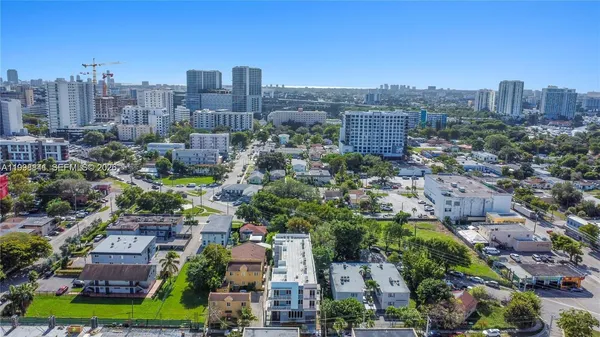 an aerial view of a city with lots of residential buildings