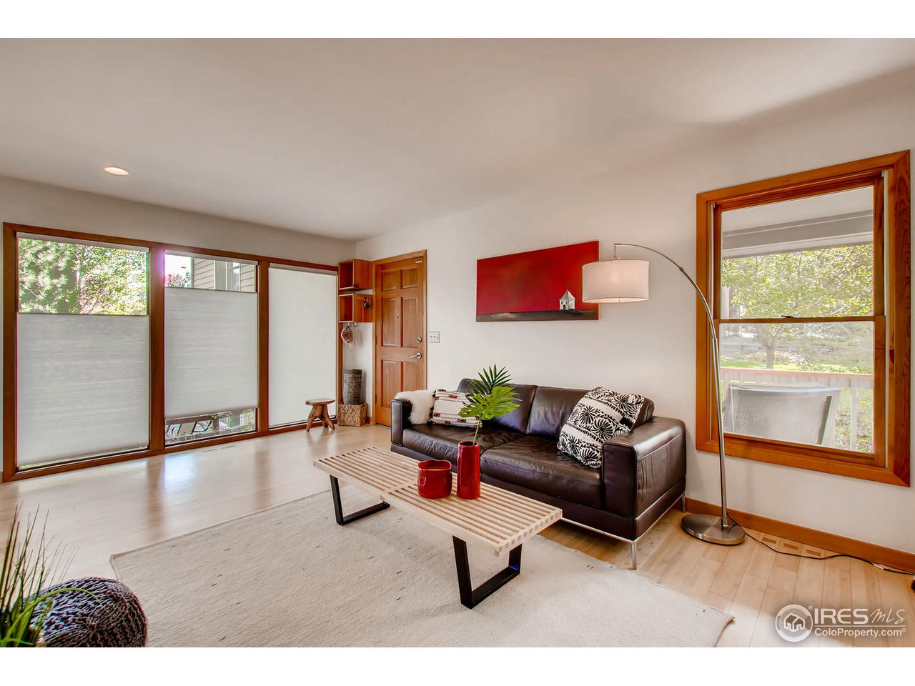 4110 Riverside Avenue Boulder, CO 80304 - Photo 11 of 39 a living room with furniture and a window