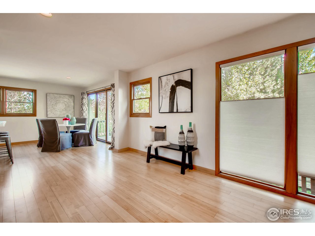 4110 Riverside Avenue Boulder, CO 80304 - Photo 12 of 39 a living room with furniture and a wooden floor