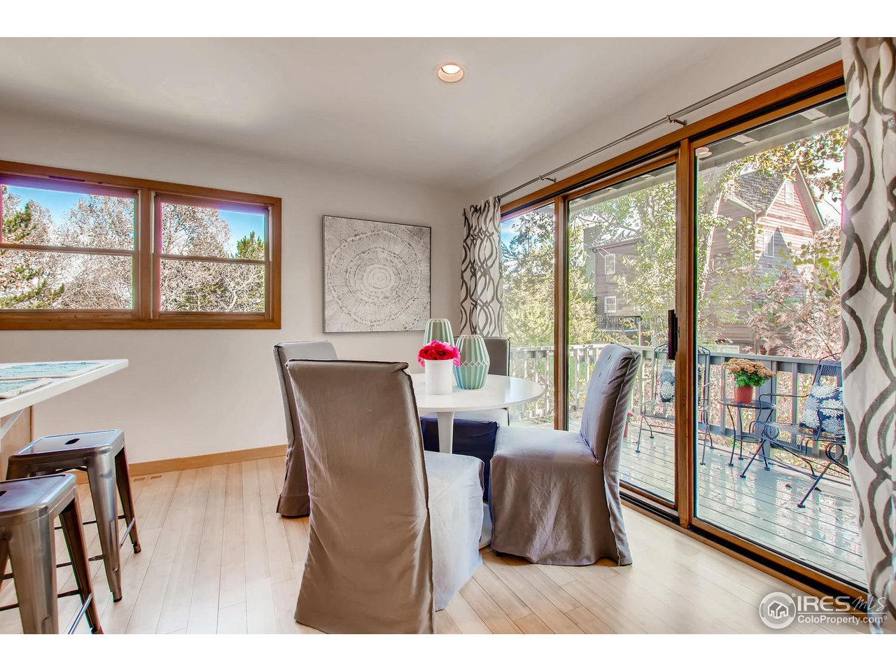 4110 Riverside Avenue Boulder, CO 80304 - Photo 14 of 39 a living room with furniture and a large window