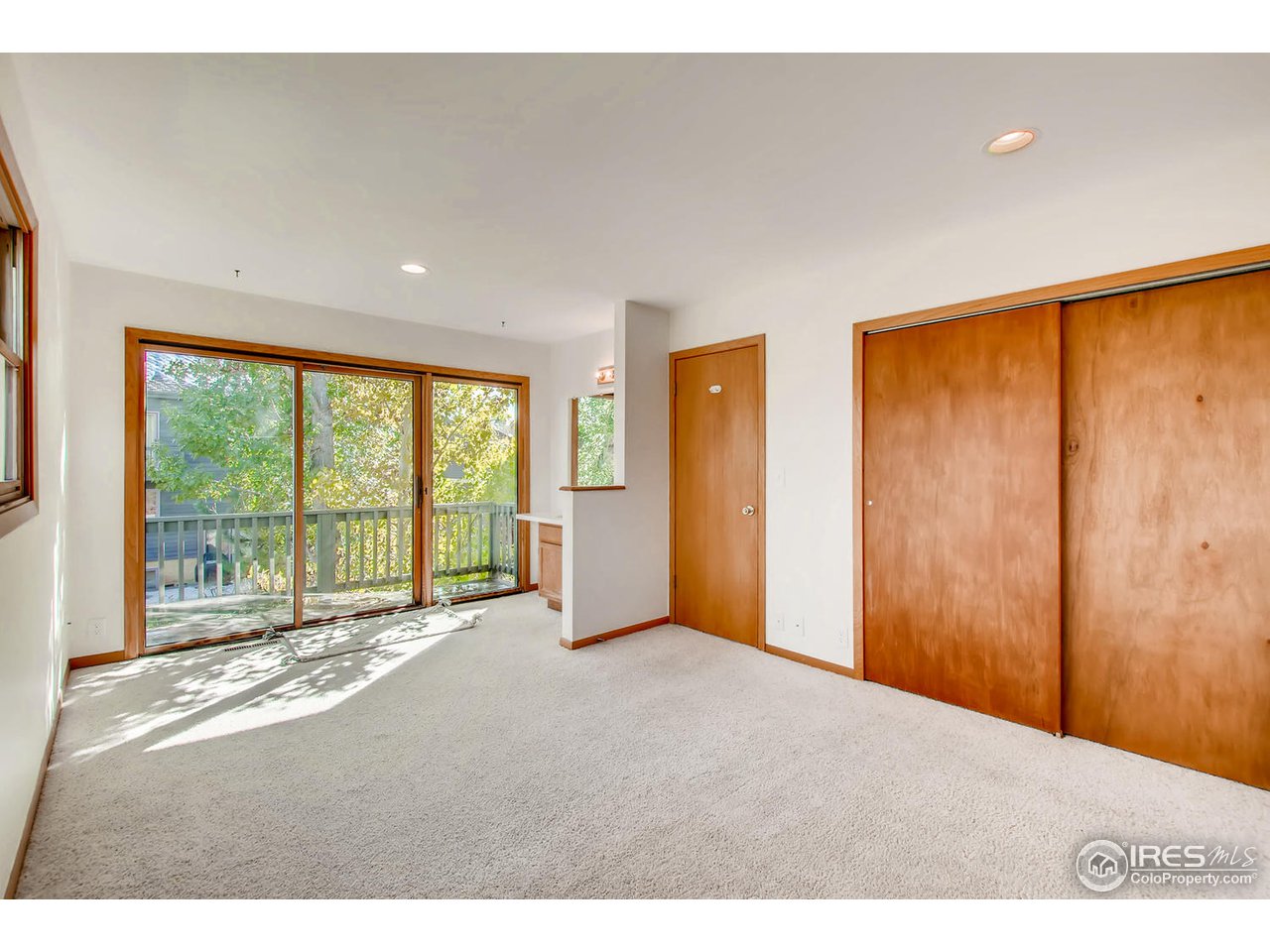 4110 Riverside Avenue Boulder, CO 80304 - Photo 19 of 39 a view of an empty room with a window