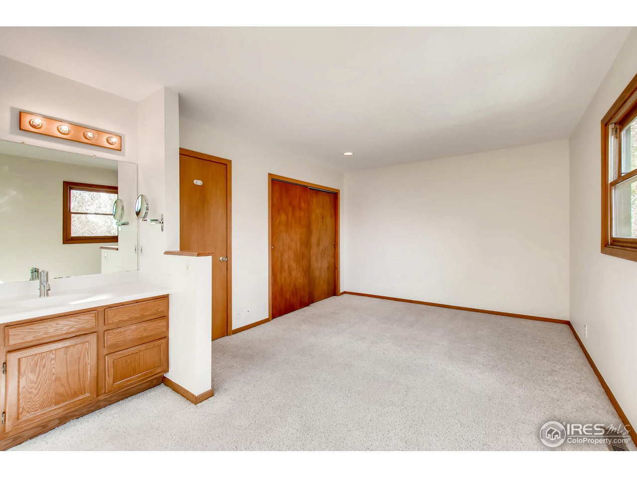 4110 Riverside Avenue Boulder, CO 80304 - Photo 20 of 39 a view of an empty room and window