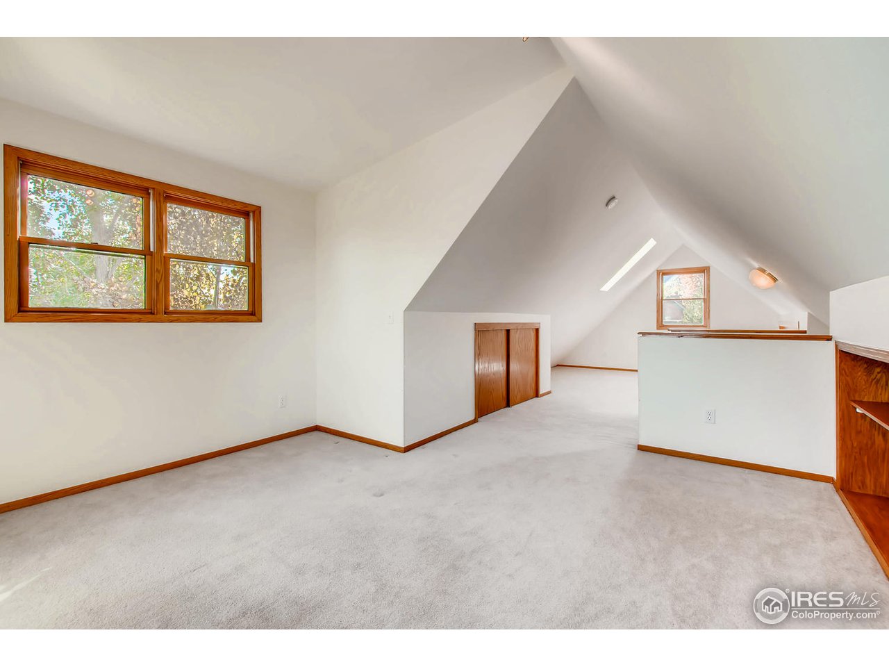 4110 Riverside Avenue Boulder, CO 80304 - Photo 23 of 39 a view of an empty room with a window