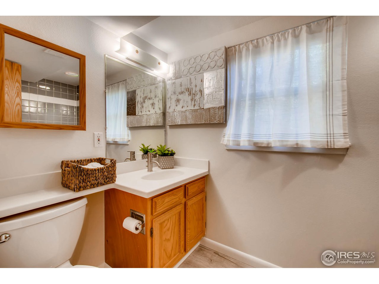 4110 Riverside Avenue Boulder, CO 80304 - Photo 30 of 39 a bathroom with a sink and a mirror