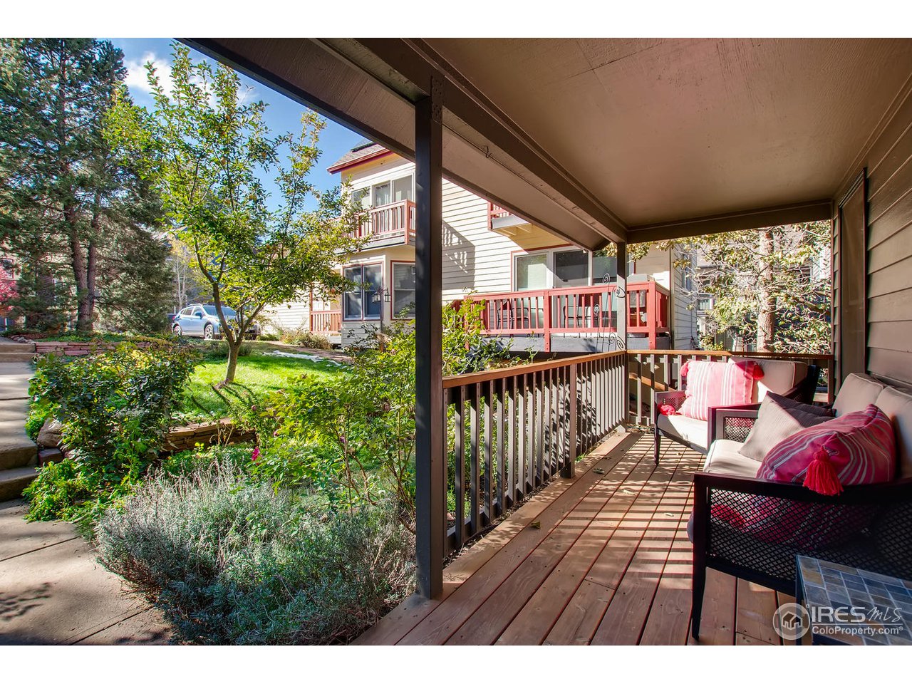 4110 Riverside Avenue Boulder, CO 80304 - Photo 9 of 39 a view of a chairs and table in patio with a yard